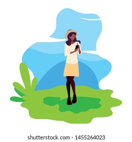 woman using smartphone device in the landscape