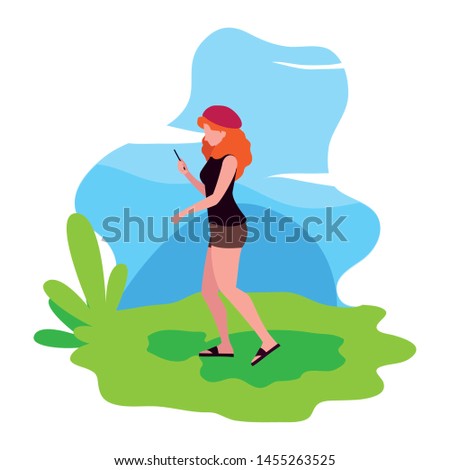 woman using smartphone device in the landscape