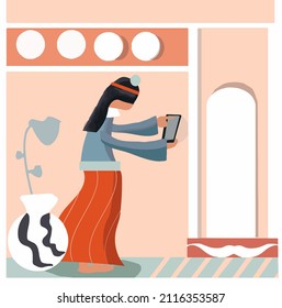
Woman is using smartphone in the elegant interior.