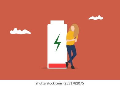 woman using smartphones with poor battery level. standing near big red battery symbol