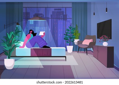 woman using tablet pc in dark night bedroom social media network online communication concept