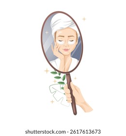 Woman using under eye patches looking in the mirror