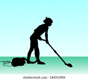 woman using vacuum cleaner
