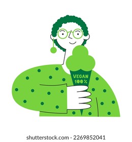 Woman with vegan ice cream in green. Vegetarian and plant-based healthy diet concept. Sustainable, cruelty-free, climate-friendly, meatless and dairy-free food. Meat and animal protein replacement.