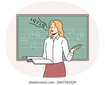 Woman vocalist sings standing near blackboard with notes and helping students develop voice. Girl holds magazine and sings wanting to become professional vocalist or audio composer