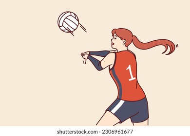 Woman volleyball player tosses ball to score goal for opposing team during tournament or training match. Girl volleyball player makes career in professional sports and plays under first number