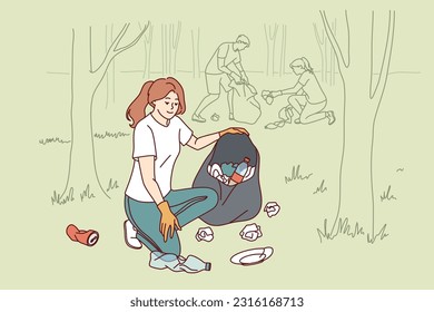 Woman volunteer collects garbage in bag, cleaning park from plastic non-degradable waste. Girl volunteer defender of wildlife is in forest picking up bottles and waste from ground.