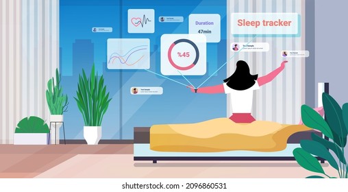 woman wake up from sleep with electronic smart watch app tracker on hand quality and quantity sleep control
