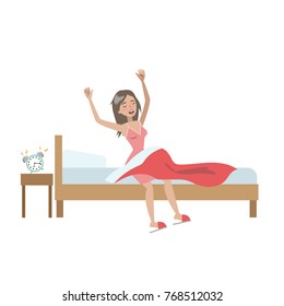 Woman waking up in the bed and stretching.
