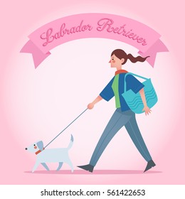 A woman walk a Labrador Retriever dog