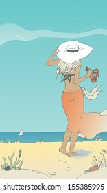Woman walking along the beach