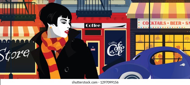 Woman is walking along the street of the evening city.