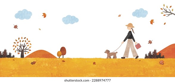 Woman walking with dog in autumn park