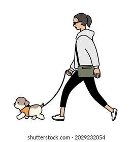 A woman walking her dog. A woman wearing sunglasses with a puppy