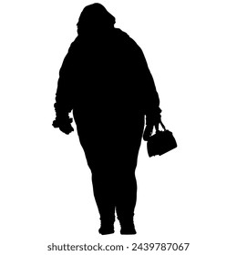 A woman walking in silhouette