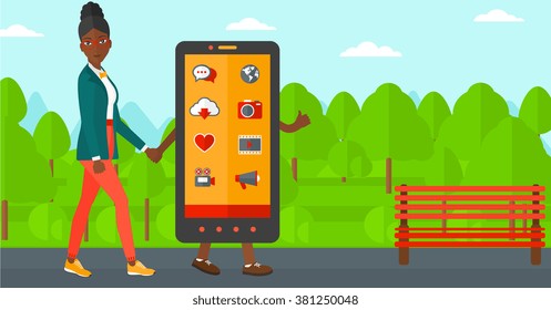 Woman walking with smartphone.