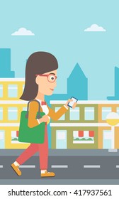 Woman walking with smartphone.