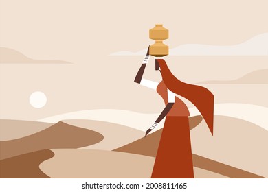 A woman walks with water pots on her head in a desert