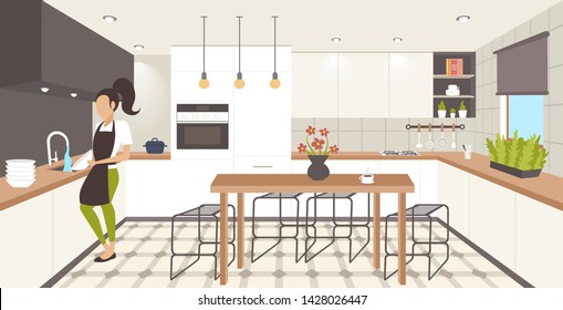woman washing dishes housewife wiping plates dishwashing concept girl in apron doing housework modern kitchen interior horizontal flat full length