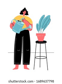 Woman watering houseplant. Home gardening. Social distancing and self-isolation. Stay safe.