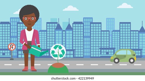 Woman watering tree with recycle sign instead of crown.