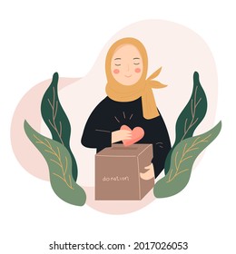 woman wear hijab give a donation for charity