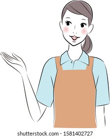 Woman wearing an apron and guiding with her hand