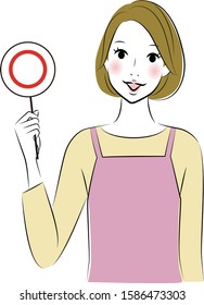Woman wearing an apron holding the correct sign