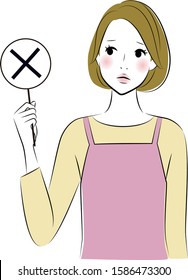Woman wearing an apron holding the wrong sign