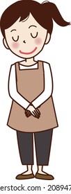 A woman wearing an apron and putting her hands in front of her.