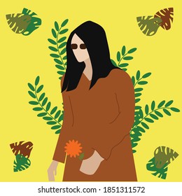 A woman wearing brown clothes and sunglasses is surrounded by plants