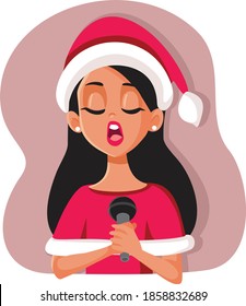Woman Wearing Santa Hat Singing Christmas Song. Female singer performing holiday music in December 

