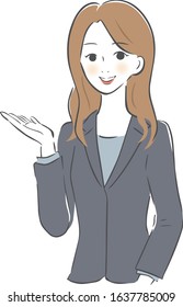 A woman wearing a suit and giving guidance