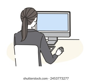 A woman wearing a suit using a computer