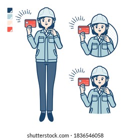 A woman wearing workwear with pointing at credit card images.
It's vector art so it's easy to edit.
