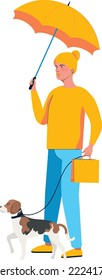 Woman wears autumn outfit with yellow umbrella and shopping bag walking with beagle.