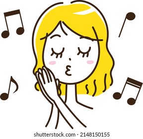 A woman who closes her eyes and sings happily clapping her hands