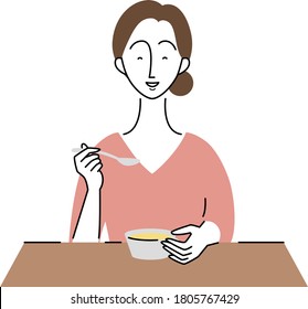 a woman who is enjoying her meal 