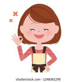 A woman who gives an OK sign.
