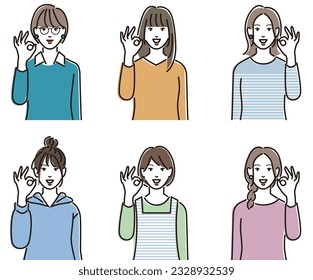 A woman who gives an OK sign and approves
