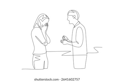 Woman who is proposed to by her partner. Engagement concept one-line drawing