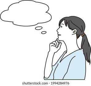 A woman who puts her hand on her chin and thinks