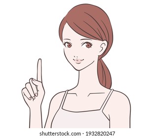 A woman who raises her index finger with a smile 