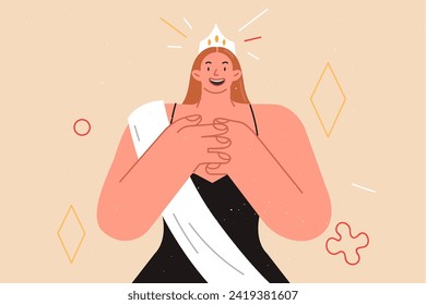 Woman winner of beauty contest rejoices at receiving crown for winning over rivals. Girl participating in beauty contest smiles, enjoying attention of audience and high marks of jury.