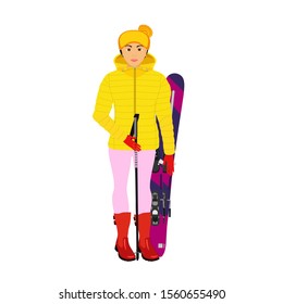 Woman in winter clothes with skis