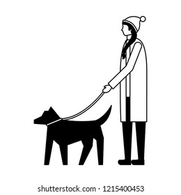 woman with winter clothes walking her dog