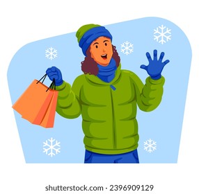 Woman in a winter jacket with winter hat and scarf holding shopping bags