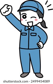 A woman in work clothes smiling and raising her fist