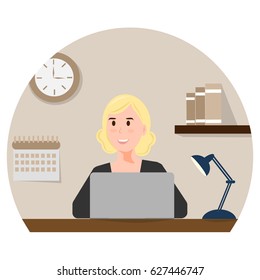 Woman worker sitting at laptop