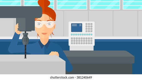 Woman working with boring mill.